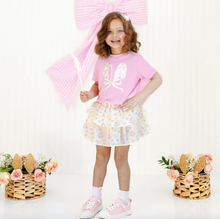 Load image into Gallery viewer, Young girl in a pink outfit with a floral skirt against a white background.
