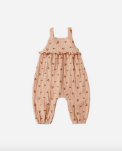 Load image into Gallery viewer, Pink ruffled overalls with a subtle pattern on a white background
