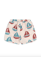 Load image into Gallery viewer, Shorts with sailboat pattern on a white background
