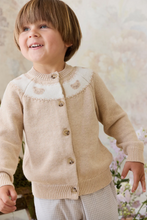 Load image into Gallery viewer, Child wearing a beige cardigan against a soft, blurred background
