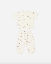 Load image into Gallery viewer, Baby onesie with short sleeves and legs on a white background
