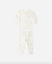 Load image into Gallery viewer, White baby pajamas with floral pattern on a white background
