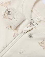 Load image into Gallery viewer, Close-up of a baby outfit with unicorn pattern and Quincy Mae label.
