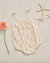 Load image into Gallery viewer, Baby romper with seahorse pattern on a light background with a flower and starfish.
