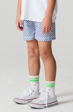 Load image into Gallery viewer, Person wearing checkered shorts, white high-top sneakers, and striped socks on a plain background
