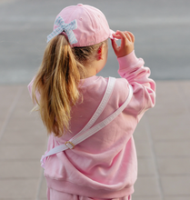 Load image into Gallery viewer, Rainbow Sparkle Bow Baseball Hat Pink

