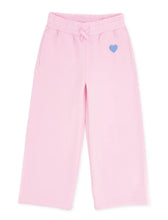 Load image into Gallery viewer, Pink sweatpants with an elastic waistband, drawstring, side pockets, and a small blue heart on the left hip, shown on a plain white background.
