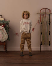 Load image into Gallery viewer, Relaxed Sweatshirt in Santa's Favorite, heather grey on a boy by a sled, full length view
