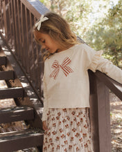 Load image into Gallery viewer, Ruffle Long Sleeve Tee in Bow, cream on a girl, side view on stairs
