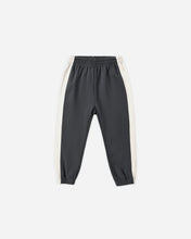 Load image into Gallery viewer, Dark gray jogger pants with off-white side stripes, featuring an elastic waistband and elastic cuffs, shown flat on a white background.
