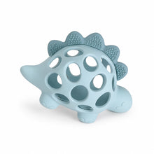 Load image into Gallery viewer, A light blue silicone dinosaur teether toy with a textured, bumpy back and circular cutouts, shown on a clean white background.
