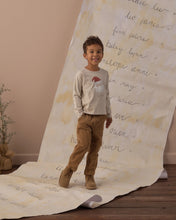 Load image into Gallery viewer, Long Sleeve Tee in Santa, cream on a boy, full length view
