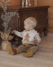 Load image into Gallery viewer, Relaxed Raglan Sweater in Gingerbread Man, cream on a toddler by a dresser
