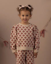 Load image into Gallery viewer, Jacquard Knit Set in Poinsettia on a smiling girl, close front view
